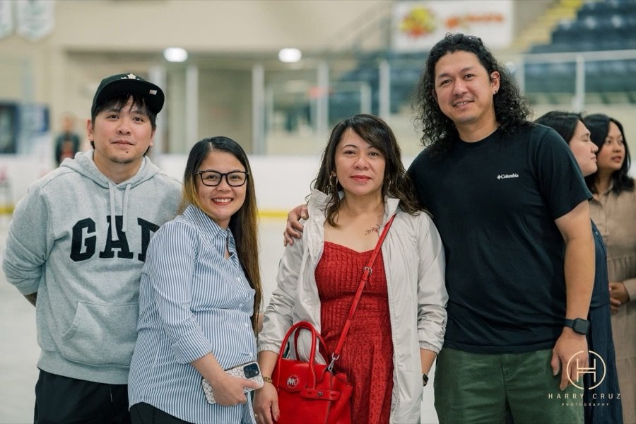 A family posing together at the event